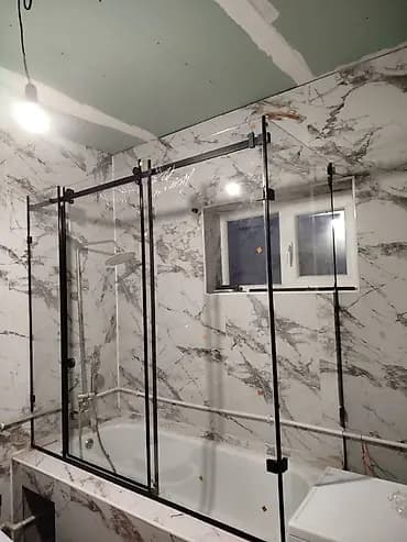 Стеклянные перегородки и душевые ограждения под заказ - Изготовление