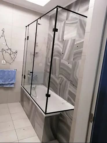 Стеклянные душевые ограждения и перегородки на заказ - Изготовление