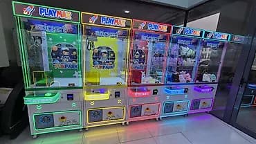 Игровые автоматы «кран-машина» PLAYMAX (серии Rocket/Space/FunPark) -