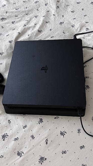 FAW: Sony PlayStation 4 Slim (чёрная) Комплектация: - Консоль PS4 Slim - lalafo.kg да — 2 FAW: Sony PlayStation 4 Slim (чёрная) Комплектация: - Консоль PS4 Slim - — 2