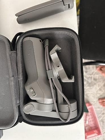 Стабилизатор для смартфона DJI Osmo Mobile (серия OM) в комплекте с at lalafo.kg Стабилизатор для смартфона DJI Osmo Mobile (серия OM) в комплекте с