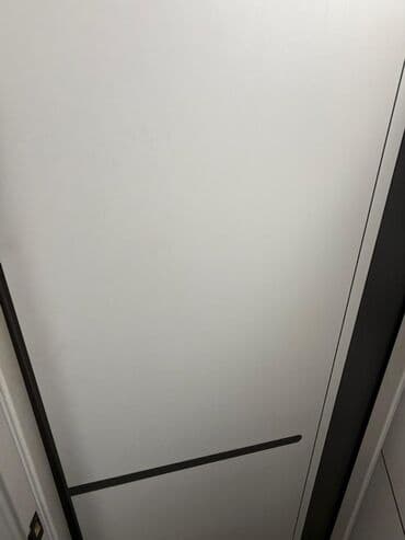 Раздвижная межкомнатная дверь-купе - Полотно: матовый белый, гладкая at lalafo.kg Раздвижная межкомнатная дверь-купе - Полотно: матовый белый, гладкая