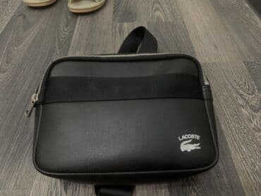 Сумка через плечо Lacoste - Цвет: черный с белым логотипом крокодила at lalafo.kg Сумка через плечо Lacoste - Цвет: черный с белым логотипом крокодила