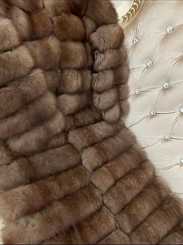 Женская шуба из натурального меха, выполненная в коричневом цвете at lalafo.kg Женская шуба из натурального меха, выполненная в коричневом цвете