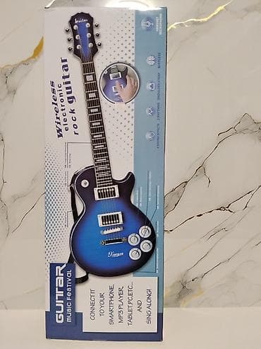 Детская беспроводная электронная рок‑гитара Guitar Music Festival at lalafo.kg Детская беспроводная электронная рок‑гитара Guitar Music Festival