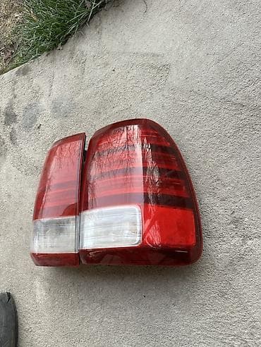 Lx470 задние фонари правый целый левый в подарок at lalafo.kg Lx470 задние фонари правый целый левый в подарок