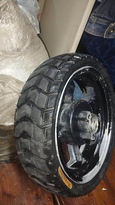 Продаётся диск с покрышкой задний на скутер размер 130-60-13 цена at lalafo.kg Продаётся диск с покрышкой задний на скутер размер 130-60-13 цена