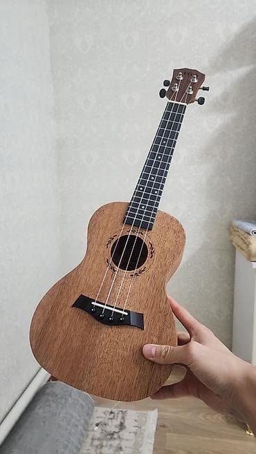 Продаю укулеле состояние новый, в комплекте чехол, струны, медиатор at lalafo.kg Продаю укулеле состояние новый, в комплекте чехол, струны, медиатор
