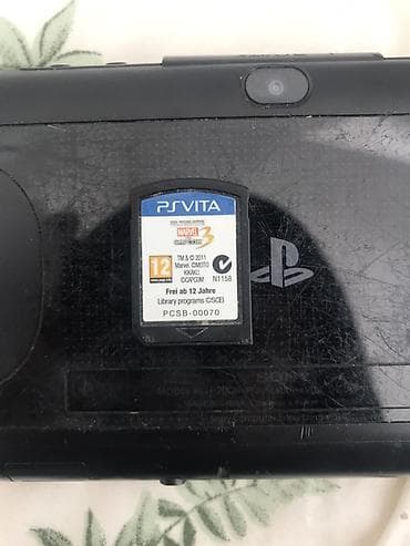 PS Vita (модель PCH-2006) — портативная игровая консоль от Sony at lalafo.kg PS Vita (модель PCH-2006) — портативная игровая консоль от Sony