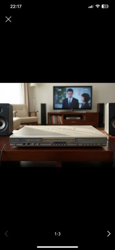 DVD-плеер AMOI, тонкий металлический корпус серебристого цвета at lalafo.kg DVD-плеер AMOI, тонкий металлический корпус серебристого цвета