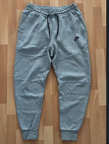 Серые спортивные штаны Nike - Размер: M (указан на ярлыке) - at lalafo.kg Серые спортивные штаны Nike - Размер: M (указан на ярлыке) -