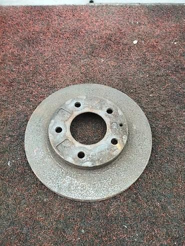 Тормозной диск Mazda Premacy CP8W 1.8 2002 перед. (б/у) at lalafo.kg Тормозной диск Mazda Premacy CP8W 1.8 2002 перед. (б/у)