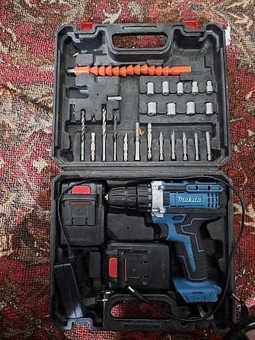 Аккумуляторная дрель‑шуруповерт в кейсе с набором принадлежностей at lalafo.kg Аккумуляторная дрель‑шуруповерт в кейсе с набором принадлежностей