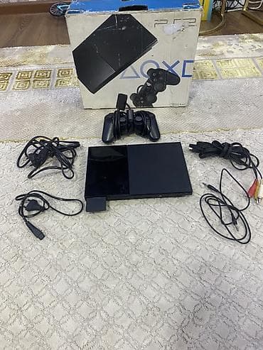 Игровая приставка Sony PlayStation 2 Slim (PS2) в комплекте. Состав at lalafo.kg Игровая приставка Sony PlayStation 2 Slim (PS2) в комплекте. Состав