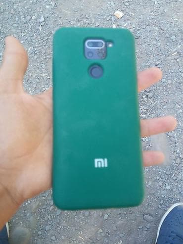 Смартфон Xiaomi в зелёном чехле Телфон не могу открыть стрит на at lalafo.kg Смартфон Xiaomi в зелёном чехле Телфон не могу открыть стрит на