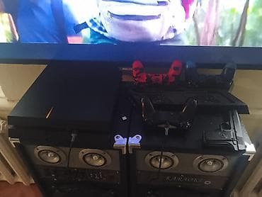 PlayStation 4 (чёрная, «Slim») с комплектом аксессуаров и at lalafo.kg PlayStation 4 (чёрная, «Slim») с комплектом аксессуаров и