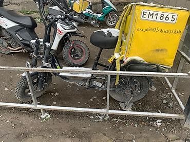 Электроскутер с грузовым боксом + съемный аккумулятор Характеристики at lalafo.kg Электроскутер с грузовым боксом + съемный аккумулятор Характеристики