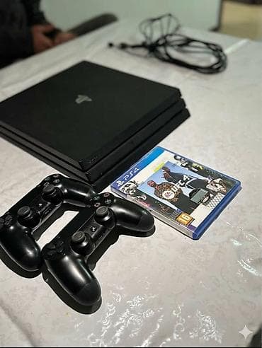 Игровая консоль Sony PlayStation 4 Pro (черная) Комплектация: - at lalafo.kg Игровая консоль Sony PlayStation 4 Pro (черная) Комплектация: -