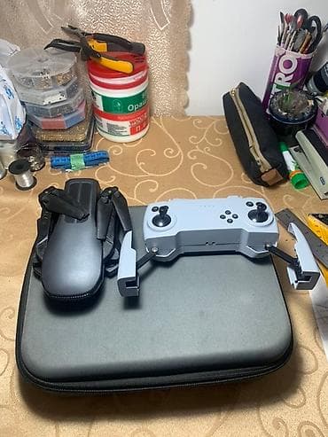 Складной квадрокоптер с пультом управления Комплектация по фото: - at lalafo.kg Складной квадрокоптер с пультом управления Комплектация по фото: -