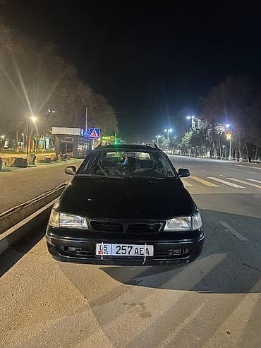 Toyota Carina E: 1996 г., 1.6 л, Механика, Бензин, Универсал at lalafo.kg Toyota Carina E: 1996 г., 1.6 л, Механика, Бензин, Универсал