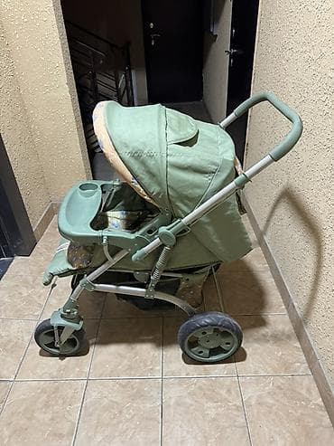 Прогулочная детская коляска, цвет светло‑зеленый с принтами at lalafo.kg Прогулочная детская коляска, цвет светло‑зеленый с принтами