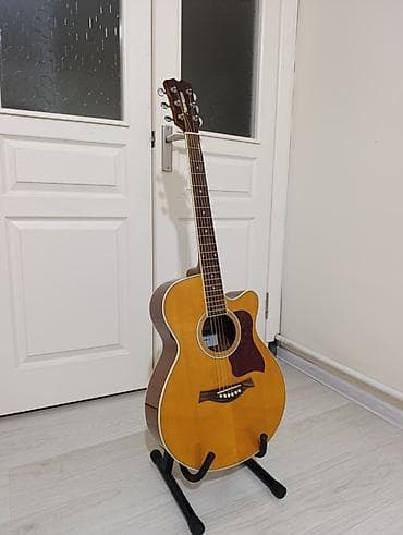 Срочно продается акустическая гитара очень хорошего качества звучание at lalafo.kg Срочно продается акустическая гитара очень хорошего качества звучание