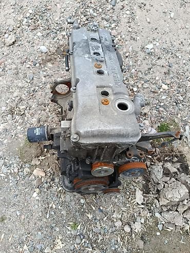 Двигатель Nissan, рядный 4-цилиндровый, DOHC, 16 клапанов (надпись на at lalafo.kg Двигатель Nissan, рядный 4-цилиндровый, DOHC, 16 клапанов (надпись на