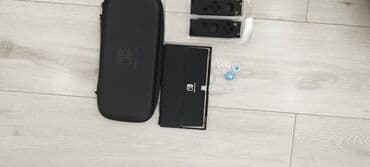 Набор аксессуаров для Nintendo Switch: - Жёсткий чехол‑кейс на молнии at lalafo.kg Набор аксессуаров для Nintendo Switch: - Жёсткий чехол‑кейс на молнии