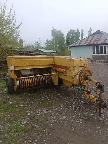 Пресс-подборщик тюковый New Holland 935 - Тип: прицепной тюковый at lalafo.kg Пресс-подборщик тюковый New Holland 935 - Тип: прицепной тюковый