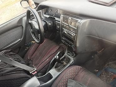 Toyota Carina E: 1992 г., Ручные, Бензин, Лифтбек at lalafo.kg Toyota Carina E: 1992 г., Ручные, Бензин, Лифтбек