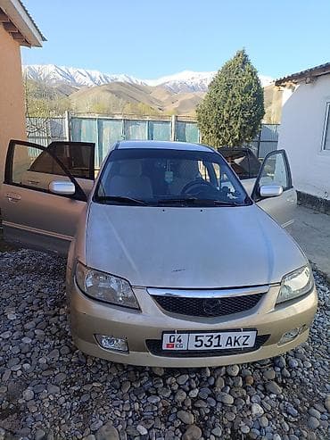 Mazda 323: 2001 г., 1.6 л, Автомат, Бензин, Универсал at lalafo.kg — 2 Mazda 323: 2001 г., 1.6 л, Автомат, Бензин, Универсал — 2
