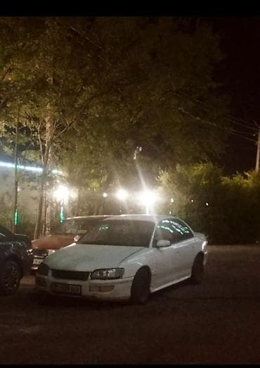 Белый седан Opel Omega B (дорестайлинг), правый руль отсутствует at lalafo.kg Белый седан Opel Omega B (дорестайлинг), правый руль отсутствует