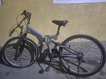 Горный велосипед с полноразмерными колёсами 26", складной рамой и at lalafo.kg Горный велосипед с полноразмерными колёсами 26", складной рамой и