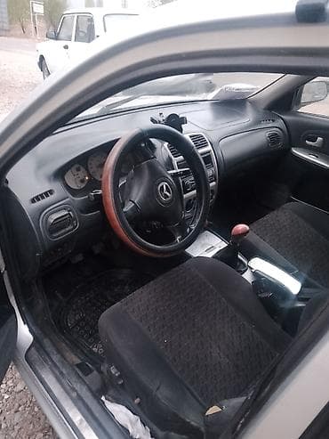 Mazda 323: 2002 г., 1.5 л, Ручные, Бензин, Универсал at lalafo.kg Mazda 323: 2002 г., 1.5 л, Ручные, Бензин, Универсал