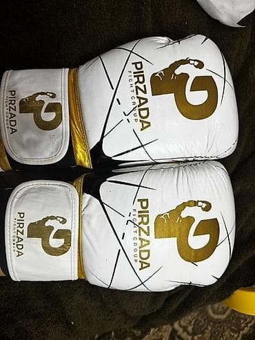 Боксерские перчатки PIRZADA Fight Group - Цвет: белый с золотистыми at lalafo.kg Боксерские перчатки PIRZADA Fight Group - Цвет: белый с золотистыми