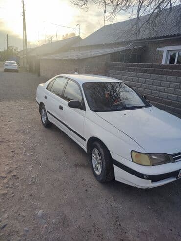 Седан белого цвета, 4 двери. Компактный кузов, аэродинамичные линии at lalafo.kg Седан белого цвета, 4 двери. Компактный кузов, аэродинамичные линии