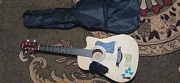 Акустическая гитара с вырезом (cutaway) + комплект аксессуаров. без at lalafo.kg Акустическая гитара с вырезом (cutaway) + комплект аксессуаров. без