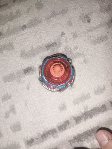 Игрушка «Бейблэйд» с пускателем (рипкорд) Комплектация: - волчок at lalafo.kg Игрушка «Бейблэйд» с пускателем (рипкорд) Комплектация: - волчок