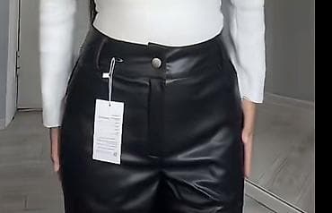 Женские брюки из чёрной эко-кожи - Крой: прямые, с высокой посадкой at lalafo.kg Женские брюки из чёрной эко-кожи - Крой: прямые, с высокой посадкой