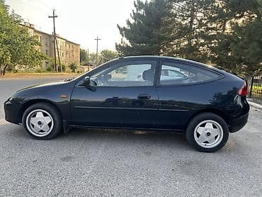 Mazda 323: 1996 г., 1.5 л, Механика, Бензин, Купе at lalafo.kg — 4 Mazda 323: 1996 г., 1.5 л, Механика, Бензин, Купе — 4