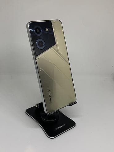 Tecno Pova 5, Б/у, 256 ГБ, цвет - Золотой, 2 SIM at lalafo.kg Tecno Pova 5, Б/у, 256 ГБ, цвет - Золотой, 2 SIM