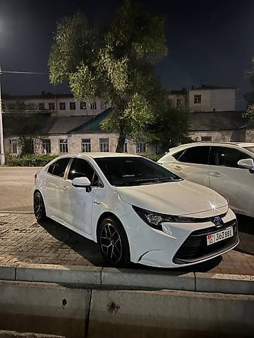 Toyota Corolla: 2023 г., 1.8 л, Вариатор, Гибрид, Седан at lalafo.kg Toyota Corolla: 2023 г., 1.8 л, Вариатор, Гибрид, Седан