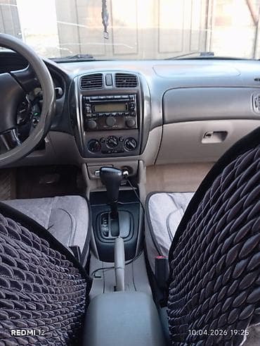 Mazda 323: 2002 г., 1.6 л, Автомат, Бензин, Хэтчбэк at lalafo.kg Mazda 323: 2002 г., 1.6 л, Автомат, Бензин, Хэтчбэк