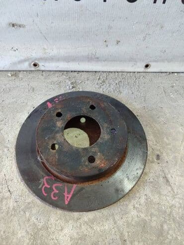 Тормозной диск NISSAN Cefiro GF-A33 VQ20(DE) 2 2000 задн. (б/у) at lalafo.kg Тормозной диск NISSAN Cefiro GF-A33 VQ20(DE) 2 2000 задн. (б/у)