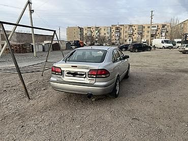 Tesla: Mazda 626: 1998 г., 2 л, Автомат, Бензин, Седан lalafo.kg да — 3 Tesla: Mazda 626: 1998 г., 2 л, Автомат, Бензин, Седан — 3