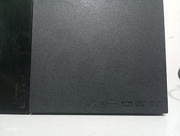 PlayStation 2 Slim (SCPH-7xxxx) — компактная игровая консоль от Sony at lalafo.kg PlayStation 2 Slim (SCPH-7xxxx) — компактная игровая консоль от Sony