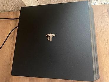 PlayStation 4 Pro (PS4 Pro) — игровая консоль от Sony с поддержкой 4K at lalafo.kg PlayStation 4 Pro (PS4 Pro) — игровая консоль от Sony с поддержкой 4K