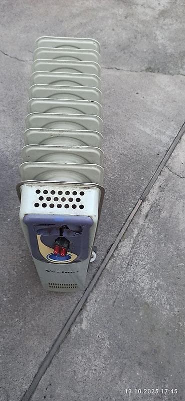 Масляный обогреватель Кол-во секций: 9, Несколько режимов мощности at lalafo.kg Масляный обогреватель Кол-во секций: 9, Несколько режимов мощности