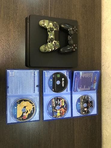 Игровая приставка Sony PlayStation 4 Slim (матовый черный корпус) at lalafo.kg Игровая приставка Sony PlayStation 4 Slim (матовый черный корпус)