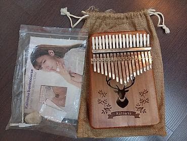 Калимба 17 клавиш - Деревянный корпус с резным узором (олень) at lalafo.kg Калимба 17 клавиш - Деревянный корпус с резным узором (олень)